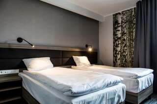 Отель Hotel Mazurek Kolo Стандартный двухместный номер с 2 отдельными кроватями-15